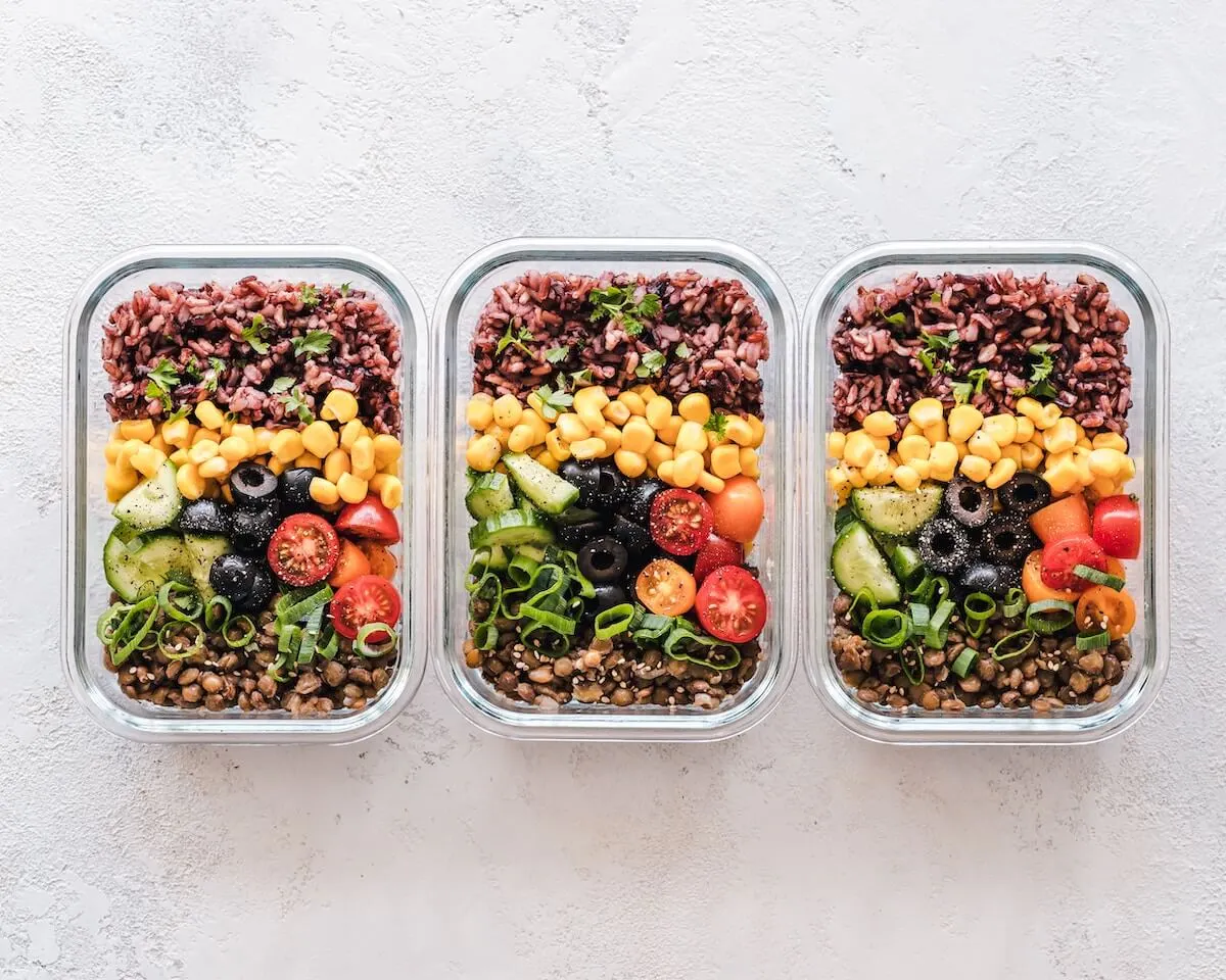 A group of containers with healthy pre-packaged food