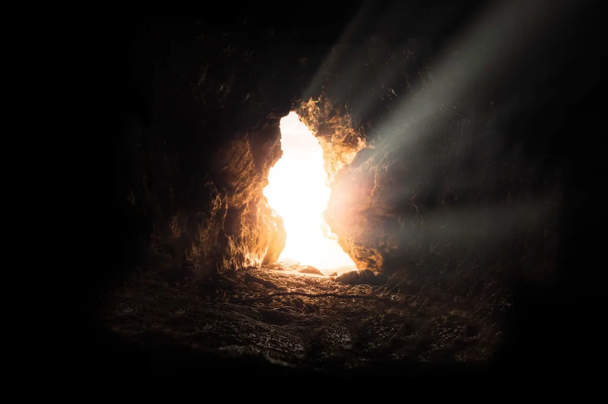 Light shining through a dark cave