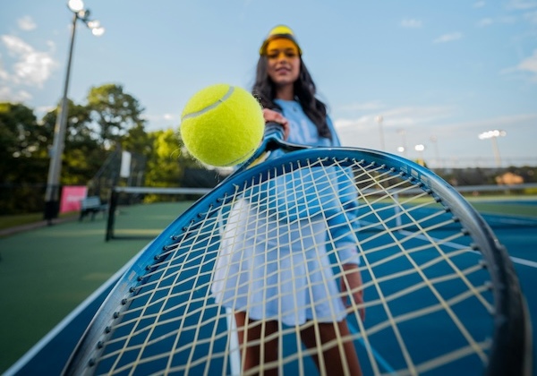 Playing tennis is one of the many brain training exercises that helps improve cognitive function